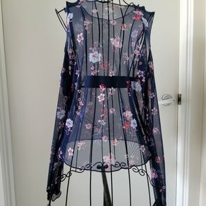 Translucent flowered off the shoulder top